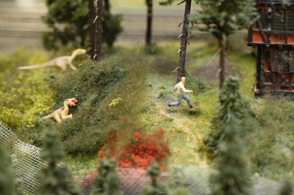 IMG_5821.JPG - Jurassic park in the  Miniatur Wunderland  ( miniature wonderland ). The world largest miniature railway not only host trains but also running cars, trucks, ship and even "flying" airplanes.