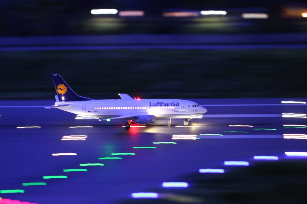 IMG_5888.JPG - Airport at night in the  Miniatur Wunderland  ( miniature wonderland ). The world largest miniature railway not only host trains but also running cars, trucks, ship and even "flying" airplanes.