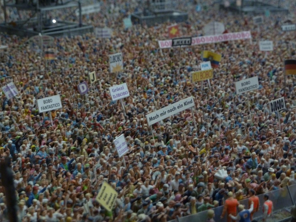 P1050395.JPG - DJ Bobo open air in the  Miniatur Wunderland  ( miniature wonderland ). The world largest miniature railway not only host trains but also running cars, trucks, ship and even "flying" airplanes.