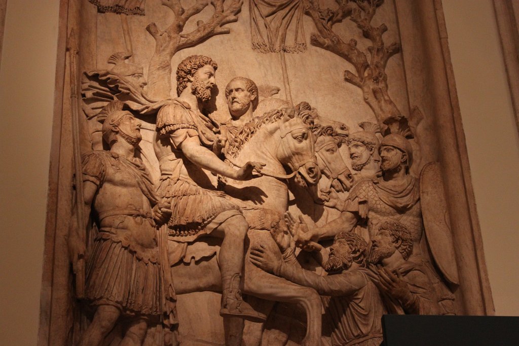 IMG_7302.JPG -  Emperor Marcus Aurelius  (161-180 AD) shows his clemence towards the vanquished after his success against Germanic tribes. Bas-relief from the Arch of Marcus Aurelius, Rome, now in the  Capitoline Museum .