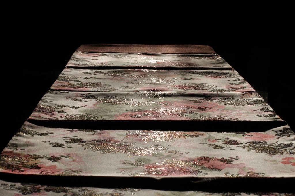 IMG_8615.JPG - Table runner in the sun. Only a small stripe of sun was coming in through the window and fell on a glass table covered by a small table runner.