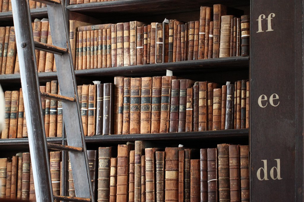 IMG_6547.JPG - The Long Room of the Old  Library  of  Trinity College  in Dublin. The library was founded together with the college in 1592. The library has legal deposit rights for Ireland and Great Britain. As such even the long room, even though extended in height, is far too small for all the books. The long room is the main chamber of the old library and was build between 1712 and 1732. It houses 200000 of the oldest books of the library.