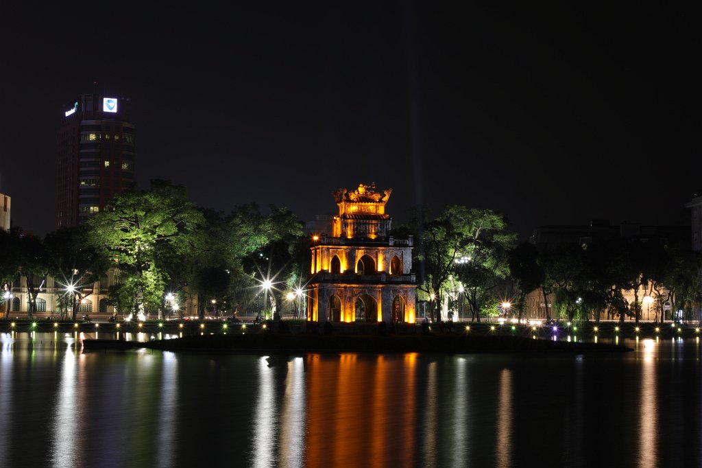 574A6009.JPG - The Turtle Tower (Tháp Rùa). The tower is on a small island in the  Hoàn Kiếm lake . The legend says that a emporer got asked by a turtle to give back a magical sword he got from the dragon god and used to defeat the chinese. The king gave back the sword and this event is memorized by this tower ( Hoàn Kiếm lake )