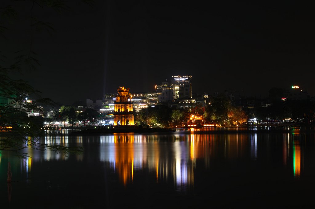 574A6024.JPG - The Turtle Tower (Tháp Rùa). The tower is on a small island in the  Hoàn Kiếm lake . The legend says that a emporer got asked by a turtle to give back a magical sword he got from the dragon god and used to defeat the chinese. The king gave back the sword and this event is memorized by this tower ( Hoàn Kiếm lake )