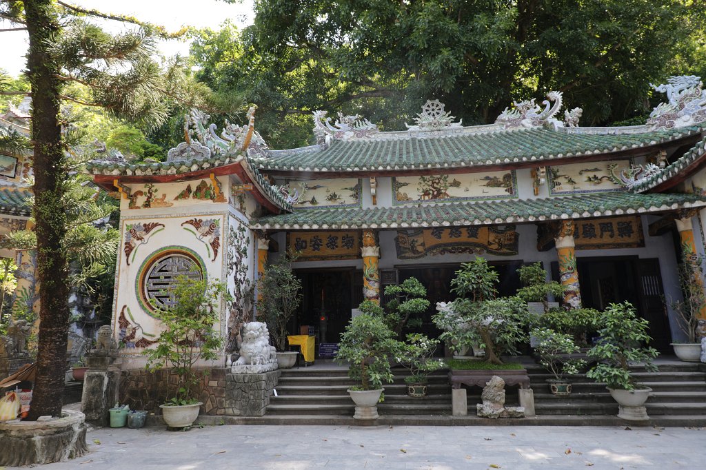 574A7851.JPG -  Marble Mountains . The marble mountain are a cluster of 5 hills named after the five elements Kim (metal), Thuy (water), Moc (wood), Hoa (fire) and Tho (earth). Thuy Son is the one which is easily accessible, through an elevator, has Buddhist and Hindu grottoes, sanctuaries, pagodas, the tower of Pho Dong and a panoramic view on the other marble mountains.