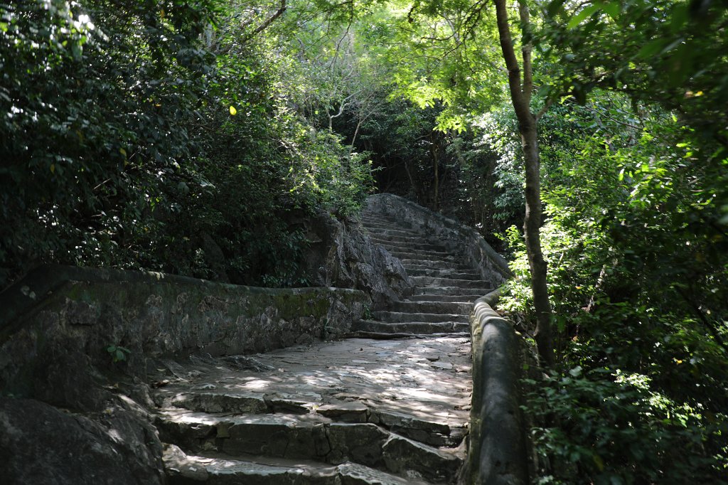 574A7892.JPG -  Marble Mountains . The marble mountain are a cluster of 5 hills named after the five elements Kim (metal), Thuy (water), Moc (wood), Hoa (fire) and Tho (earth). Thuy Son is the one which is easily accessible, through an elevator, has Buddhist and Hindu grottoes, sanctuaries, pagodas, the tower of Pho Dong and a panoramic view on the other marble mountains.