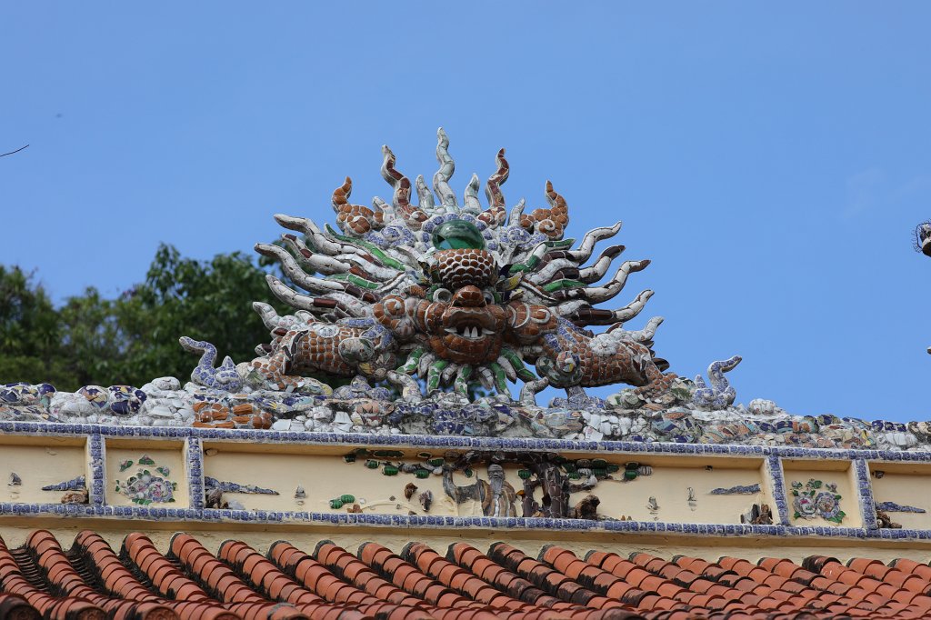 574A7925.JPG -  Marble Mountains . The marble mountain are a cluster of 5 hills named after the five elements Kim (metal), Thuy (water), Moc (wood), Hoa (fire) and Tho (earth). Thuy Son is the one which is easily accessible, through an elevator, has Buddhist and Hindu grottoes, sanctuaries, pagodas, the tower of Pho Dong and a panoramic view on the other marble mountains.