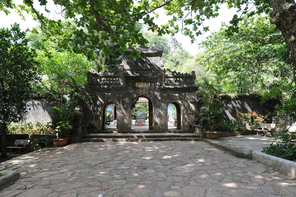 574A7945.JPG -  Marble Mountains . The marble mountain are a cluster of 5 hills named after the five elements Kim (metal), Thuy (water), Moc (wood), Hoa (fire) and Tho (earth). Thuy Son is the one which is easily accessible, through an elevator, has Buddhist and Hindu grottoes, sanctuaries, pagodas, the tower of Pho Dong and a panoramic view on the other marble mountains.