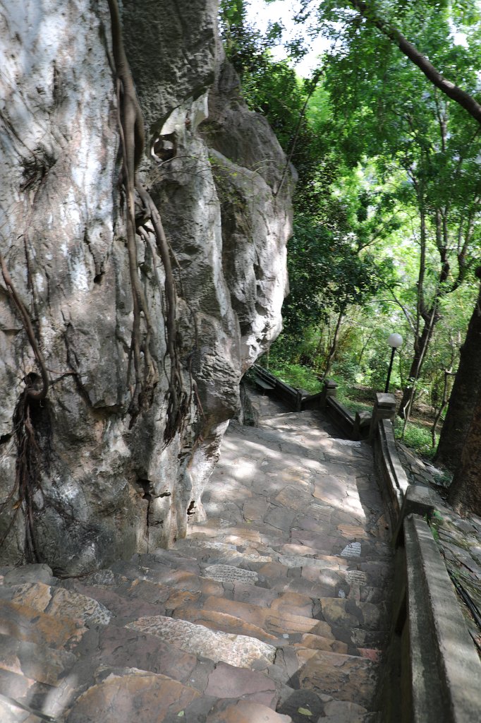 574A7951.JPG -  Marble Mountains . The marble mountain are a cluster of 5 hills named after the five elements Kim (metal), Thuy (water), Moc (wood), Hoa (fire) and Tho (earth). Thuy Son is the one which is easily accessible, through an elevator, has Buddhist and Hindu grottoes, sanctuaries, pagodas, the tower of Pho Dong and a panoramic view on the other marble mountains.